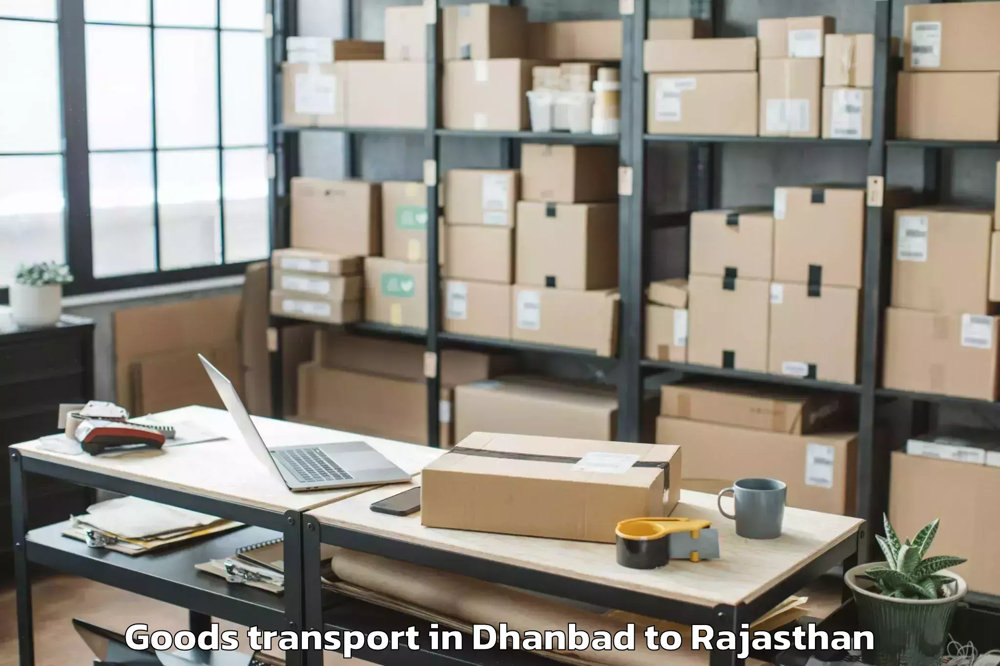 Hassle-Free Dhanbad to Jaipur National University Jai Goods Transport